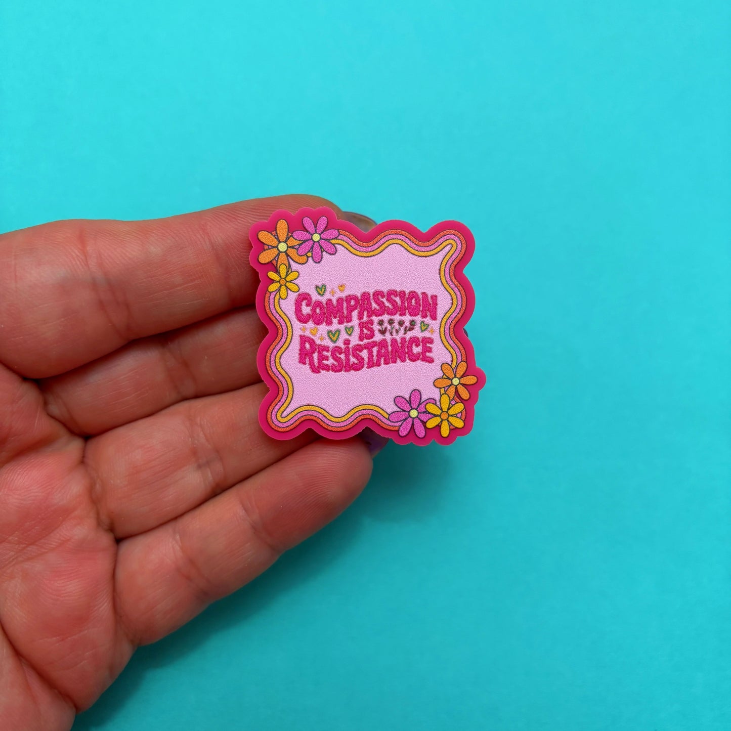 Compassion Is Resistance Pin