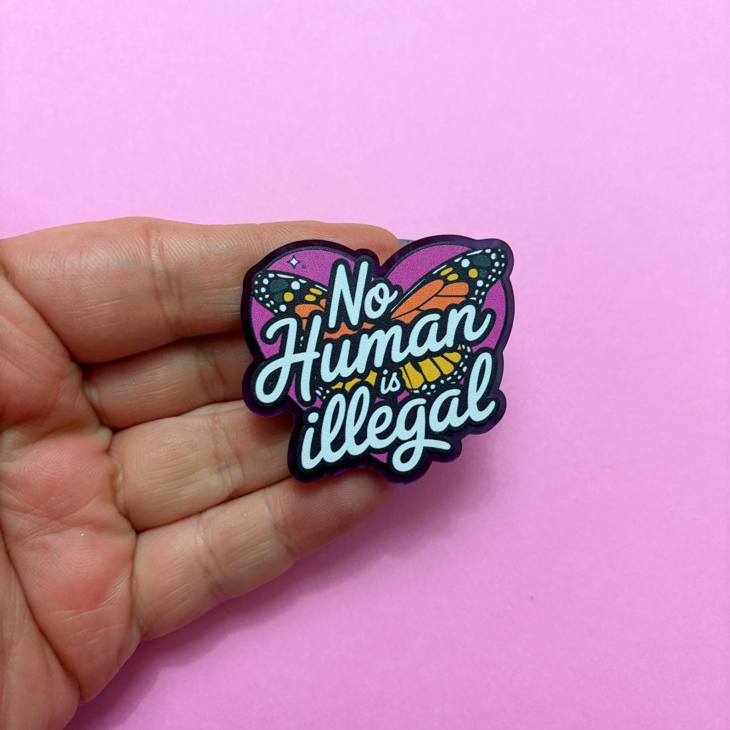 No Human Is Illegal Pin